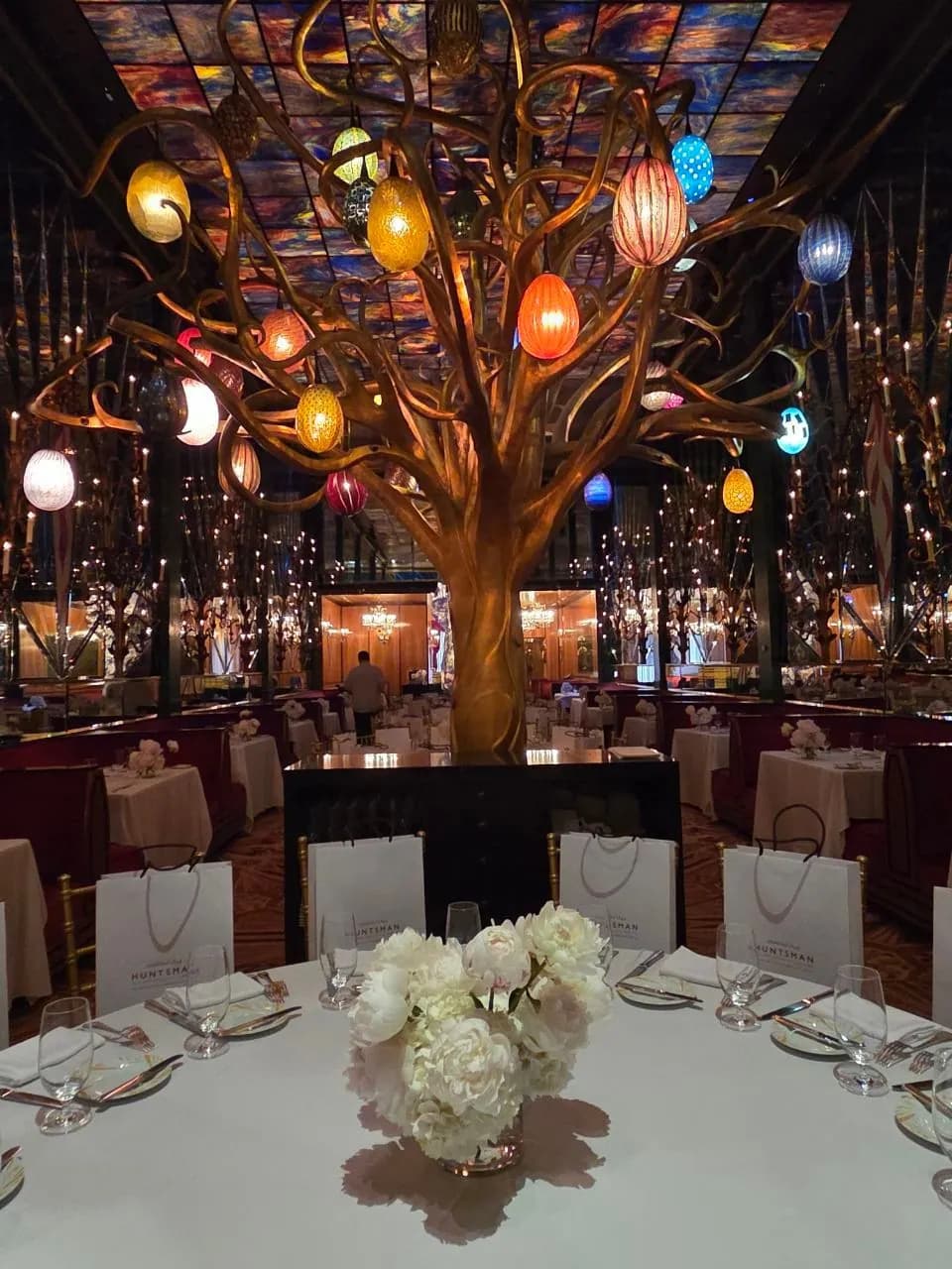 Russian Tea Room event with peonies beneath the gilded tree