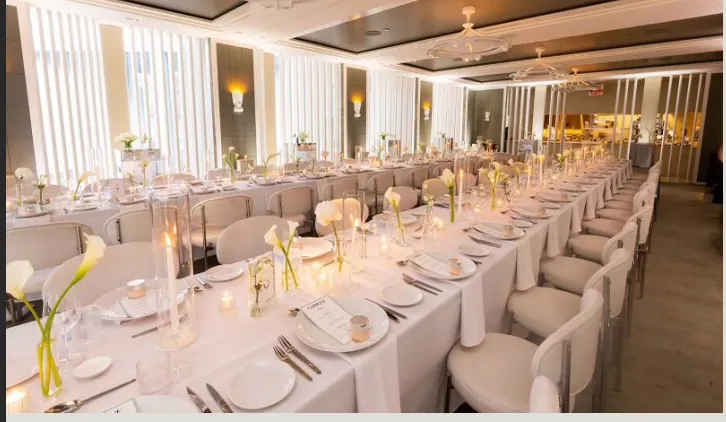 Long banquet table set for a private dinner at Sereine